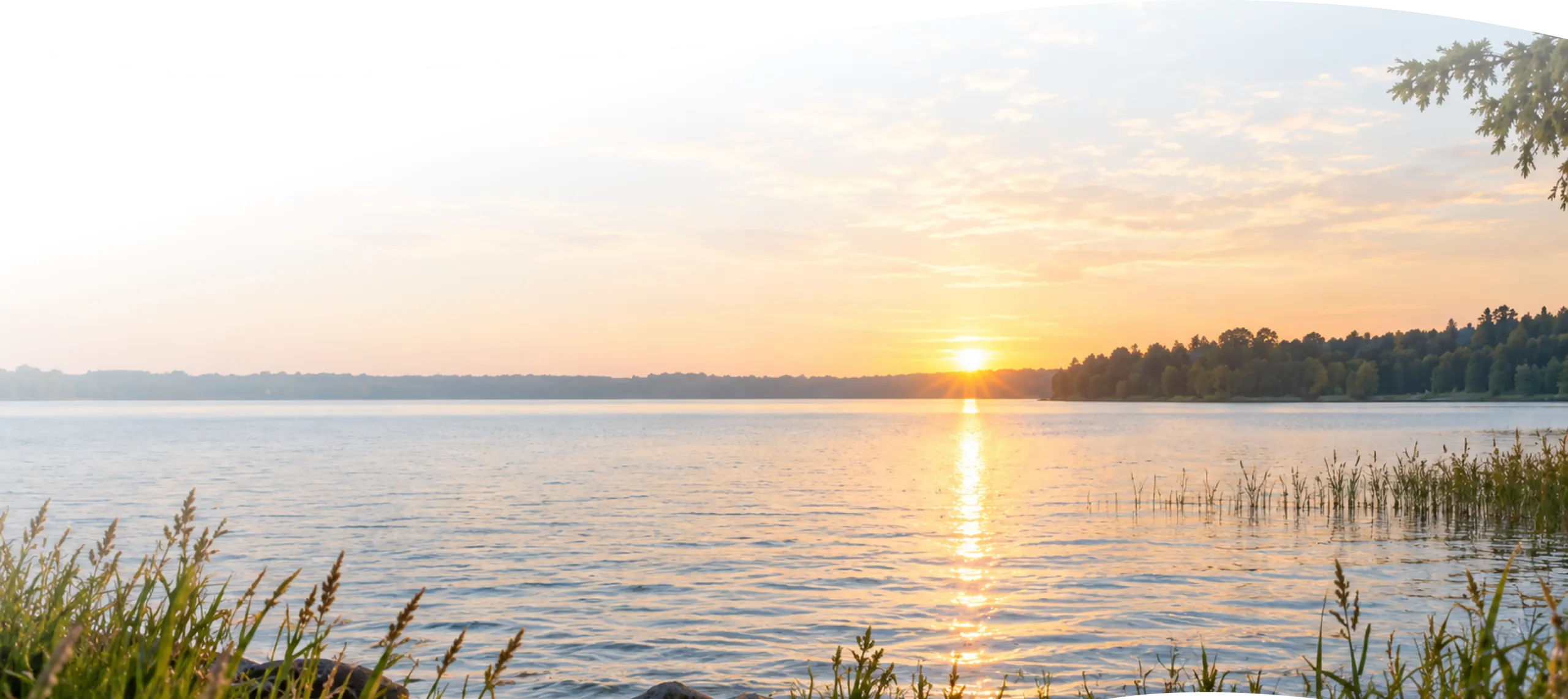 Lake at sunrise with reeds, Glacial Lakes region